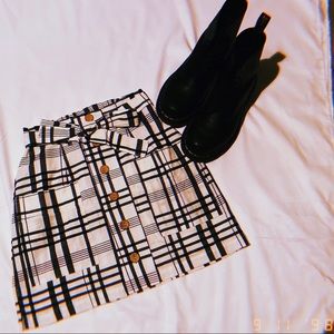 Black and white skirt. Never worn. Perfect condition. Multiple sizes available.